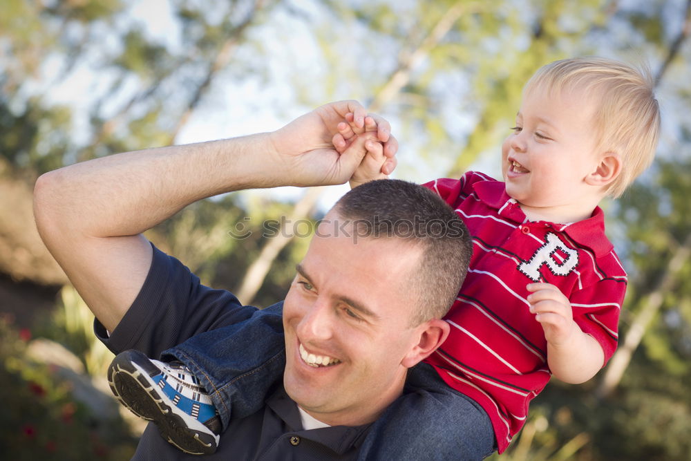 Similar – young dad and son playing outdoors at sunset. family concept