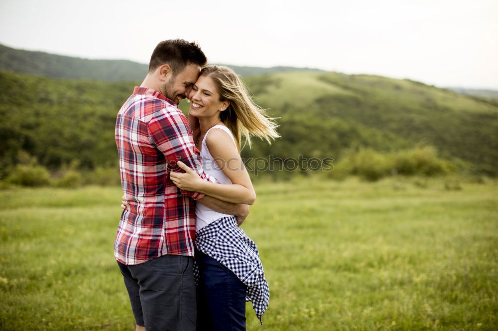 Similar – Image, Stock Photo happy lovers on Holiday in the alps mountains