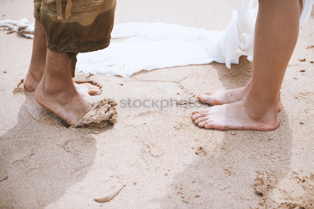 Image, Stock Photo Crop bride and groom on sand