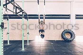 Similar – Image, Stock Photo People training in gym olimpic rings and chin bar