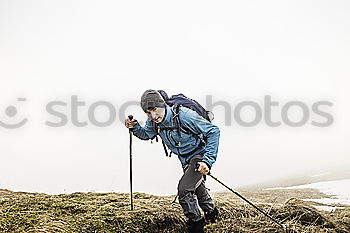 Similar – Young woman on the via ferrata