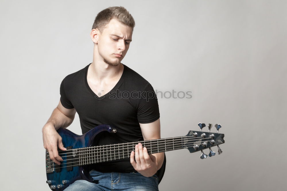 Similar – Image, Stock Photo outdoor photo session with a bass player and his instruments