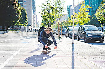 Similar – Image, Stock Photo Skateboarding woman practicing at skatepark