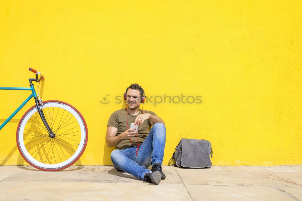 Similar – Image, Stock Photo Side view of a young hipster man with a fixed bike