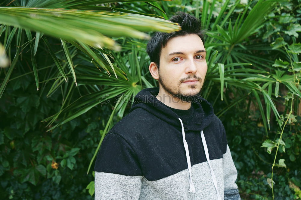 Image, Stock Photo young attractive man in calm surrounded by plants