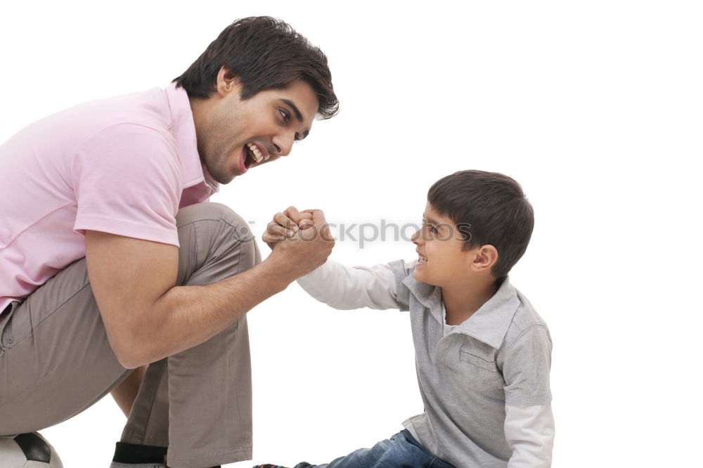 Similar – sad son hugging his dad near wall at the day time