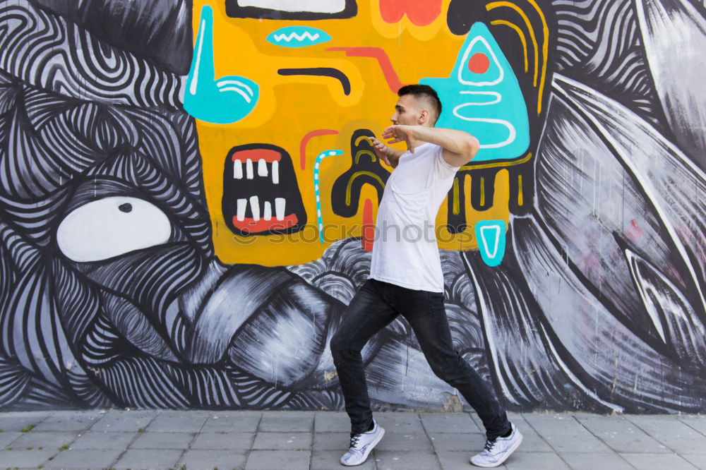 Casual man on street looking away