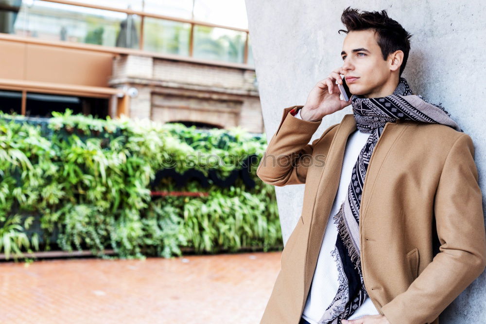 Similar – Image, Stock Photo Modern young man with mobile phone in the street.