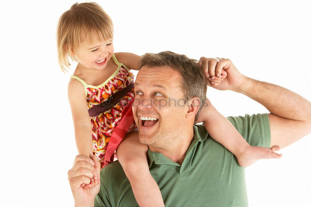 Similar – Father and daughter playing at home. Little girl closing dads eyes with hands and laughing. Family fun together