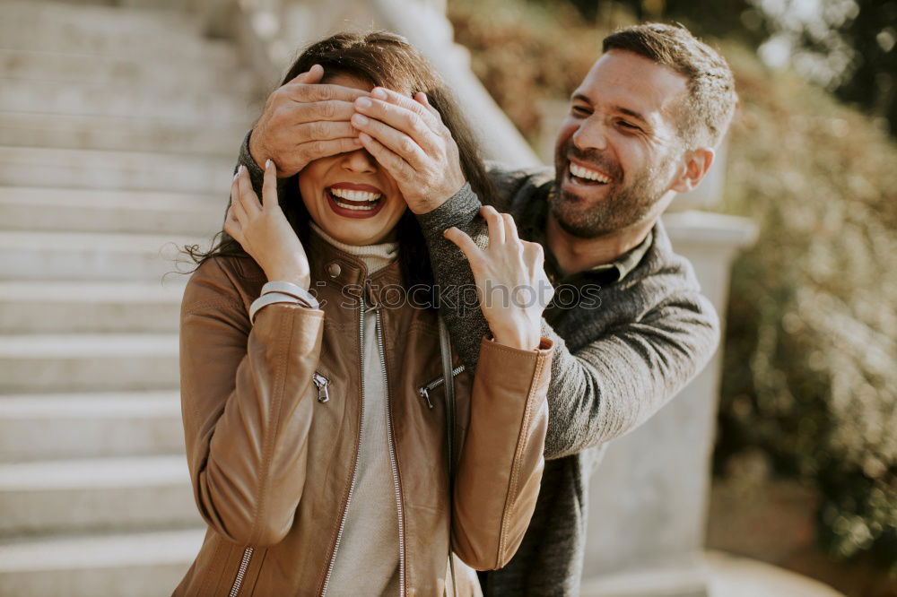 Similar – Smiling bearded man giving a piggy back to his girlfriend.