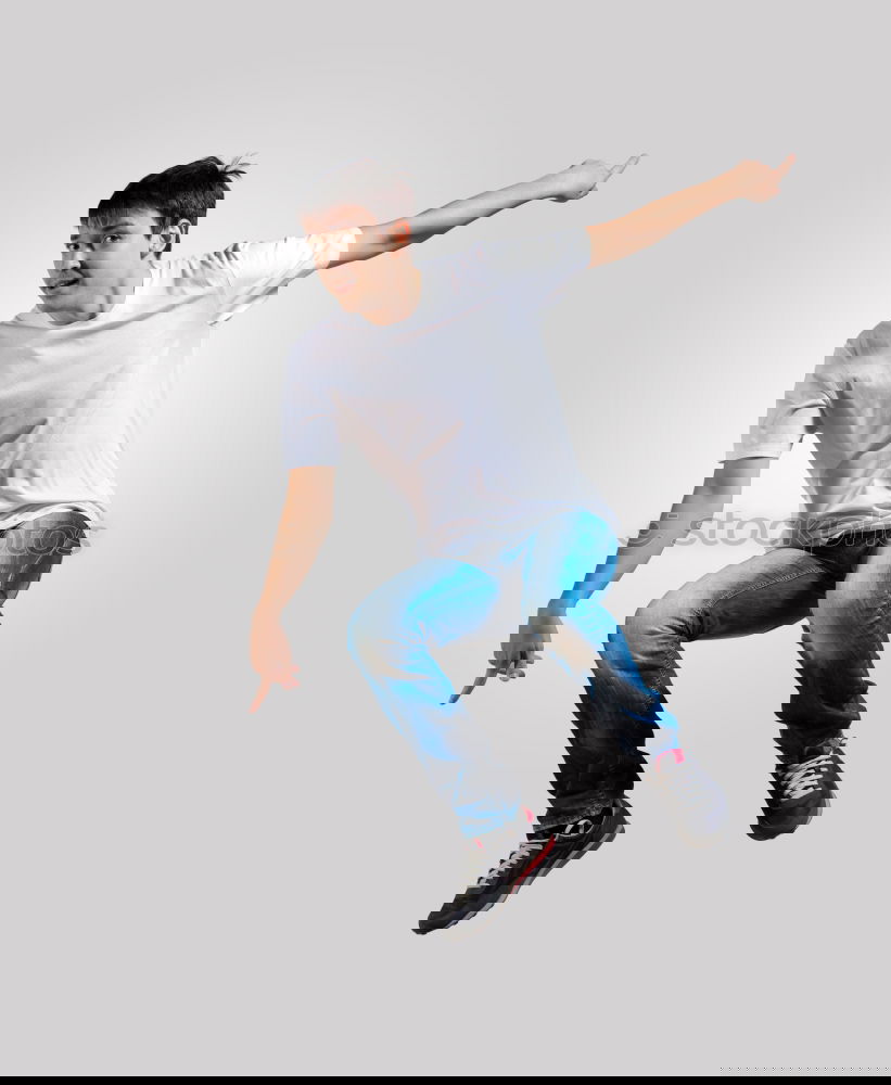 Similar – Image, Stock Photo Young man jumping in urban background
