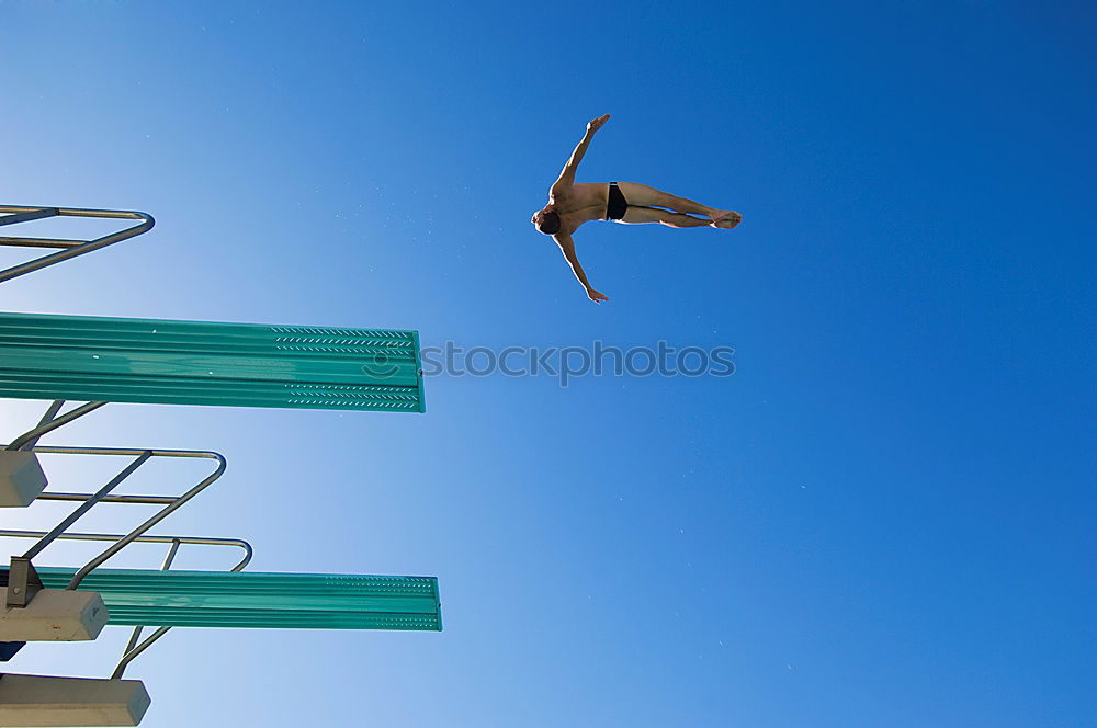 Similar – Woman with afro hair climbing by children’s attractions.