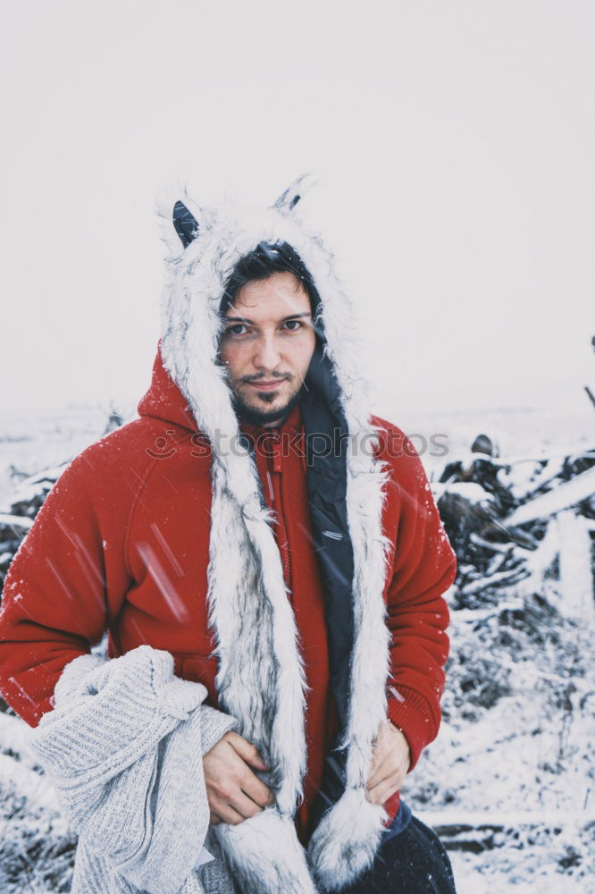 Similar – Image, Stock Photo Young and attractive man enjoying a snowy winter day