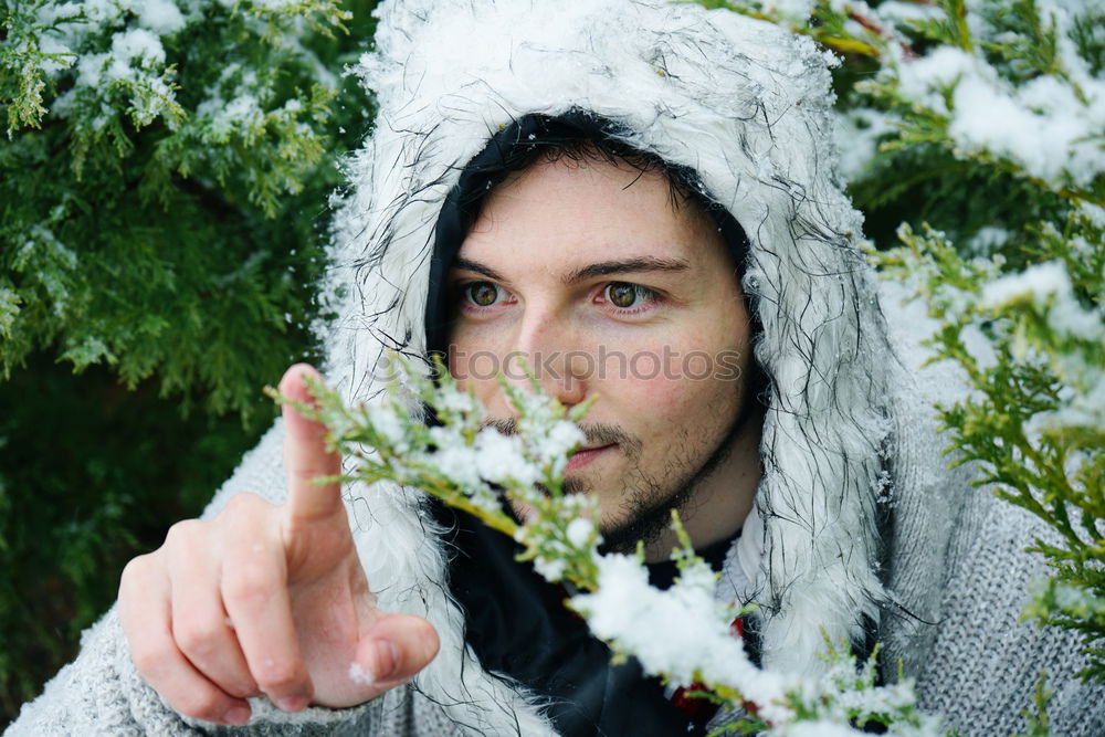 Similar – Image, Stock Photo Young and attractive man enjoying a snowy winter day