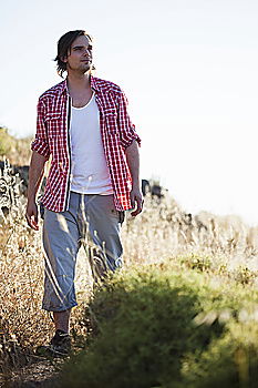 Similar – Image, Stock Photo Young man in a sunny autumn day