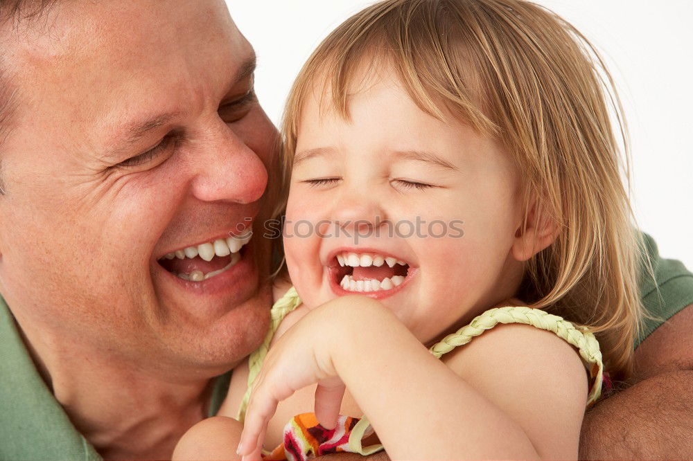 Similar – Father and daughter playing at home. Little girl closing dads eyes with hands and laughing. Family fun together