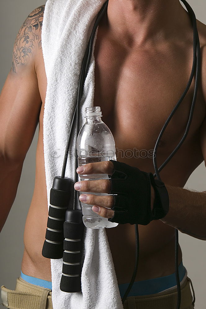 Similar – Man wrapping hands with bandages before boxing training