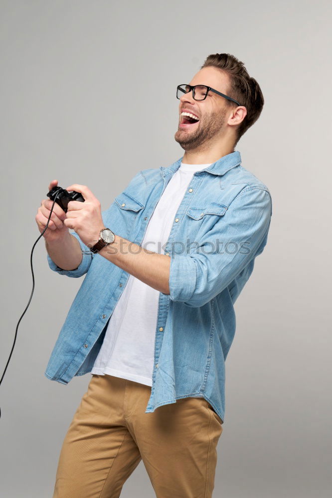 Similar – Young nerd playing video games