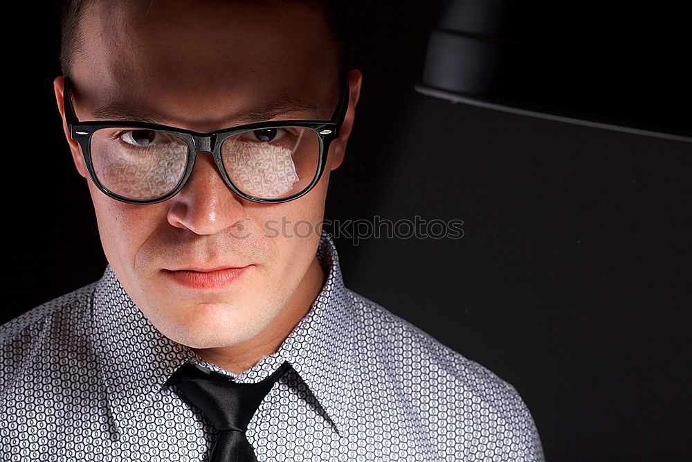 Determined man with glasses