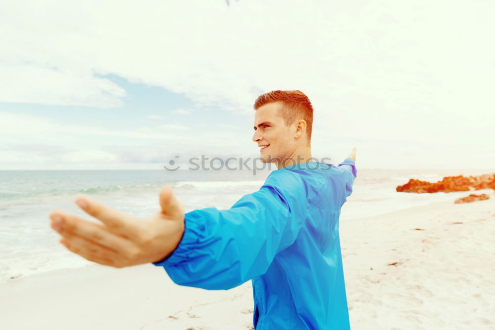 Similar – Young sports man is doing yoga for preparation of his workout