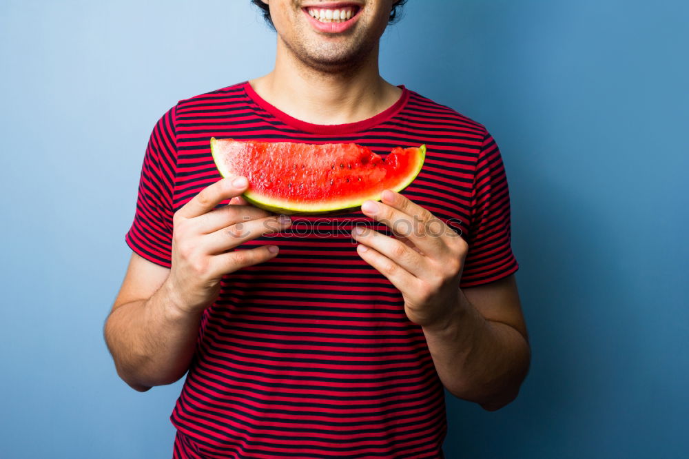 Similar – Not so young but happy Caucasian woman chewing watermelon