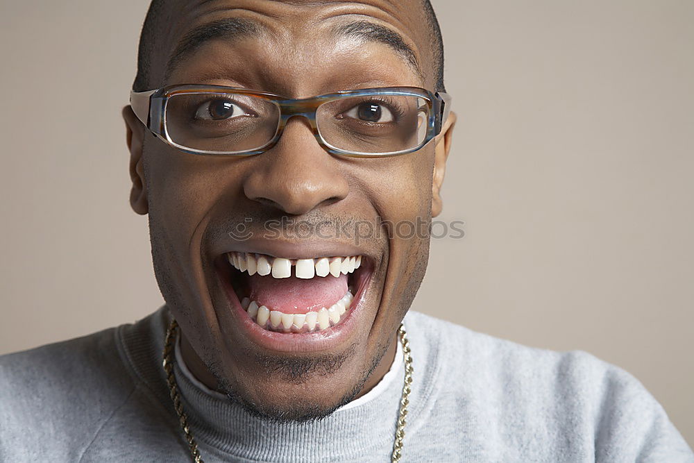 Similar – Portrait of funny black shouting at camera