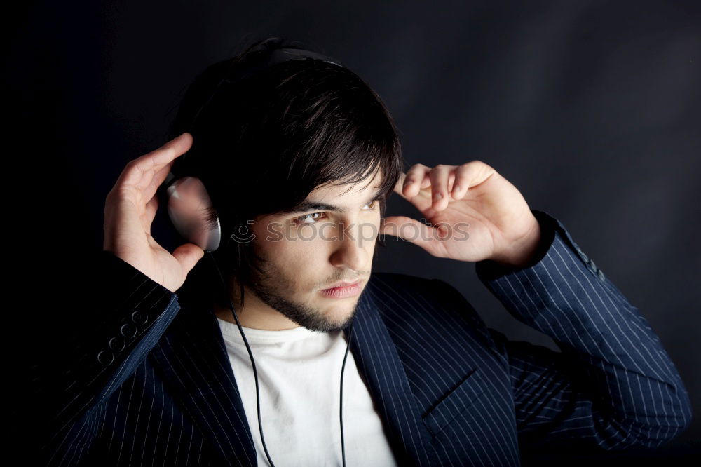 Similar – Image, Stock Photo Young handsome man over a dark brick wall