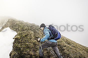 Similar – Young woman on the via ferrata