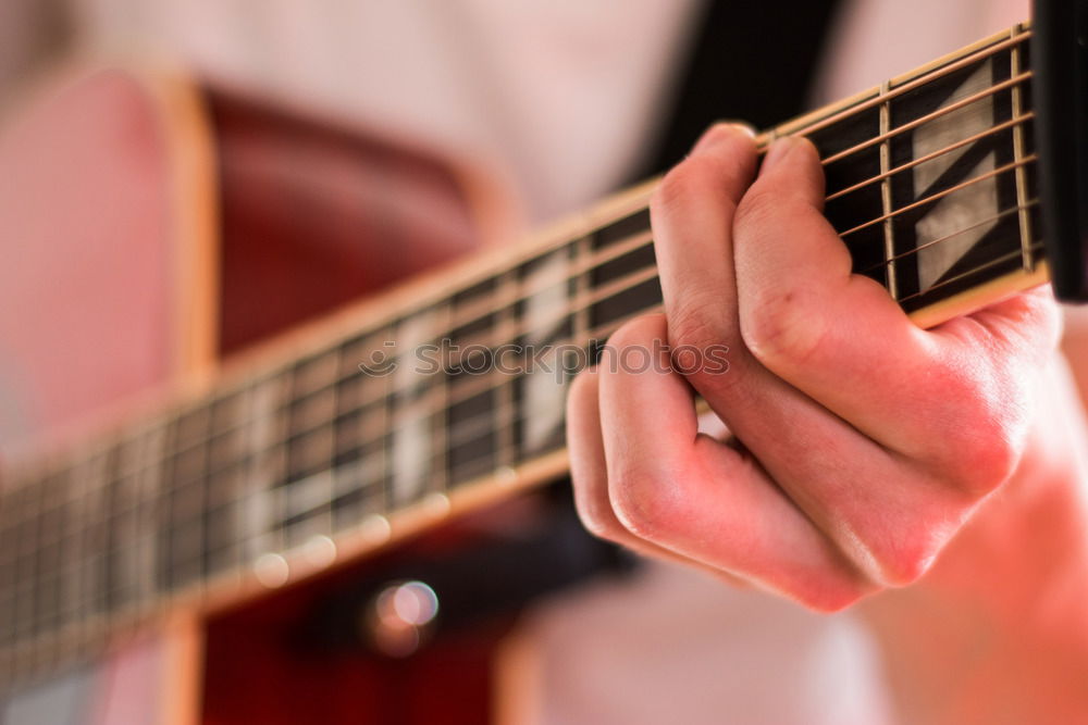 Similar – Man playing electric guitar