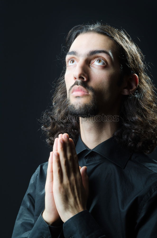 Similar – Young man with gap teeth and long hair