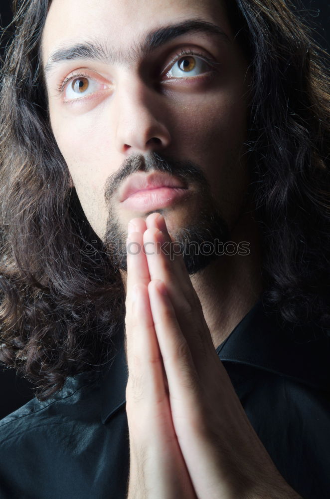 Similar – Young man with gap teeth and long hair