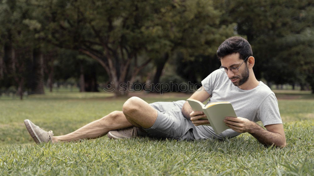 Similar – Image, Stock Photo Teen boy reading a book