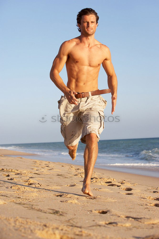 Similar – handsome swimmer putting on goggles