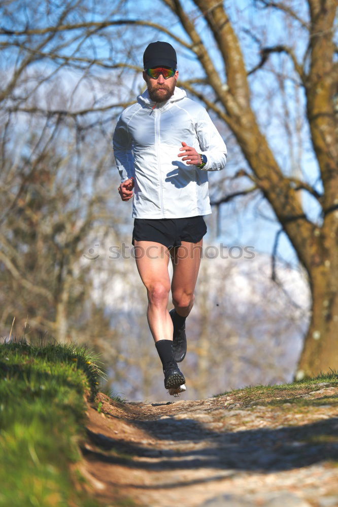 Similar – Senior Man Running in the Forest