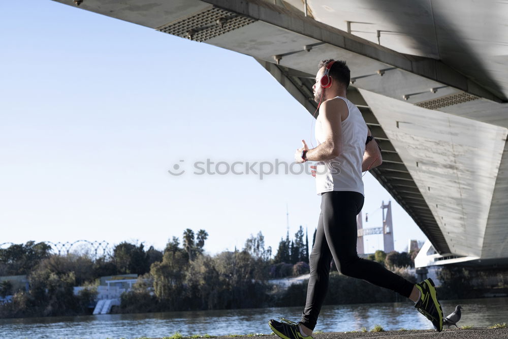 Similar – Young fitness woman runner stretching legs after run.