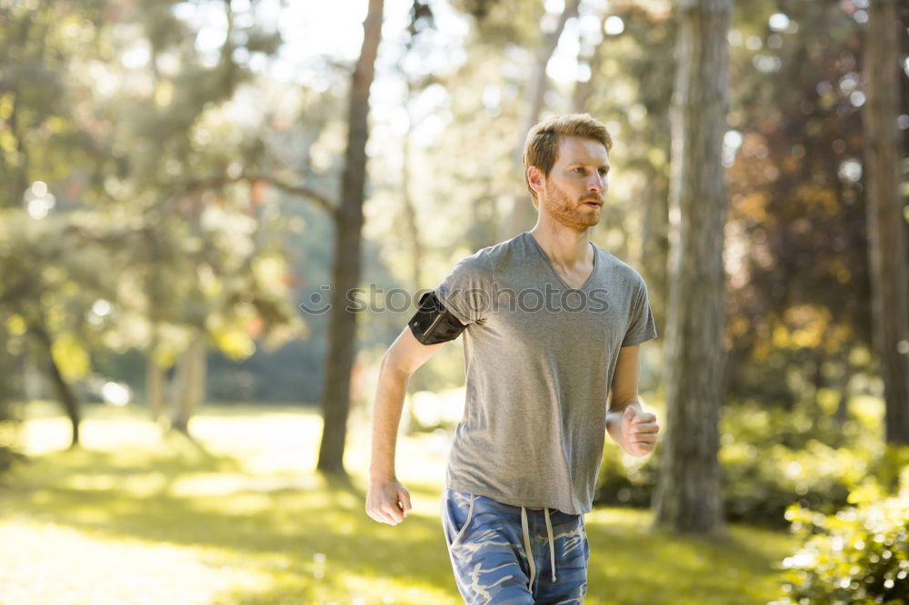 Similar – Image, Stock Photo Young man doing stretching exercises