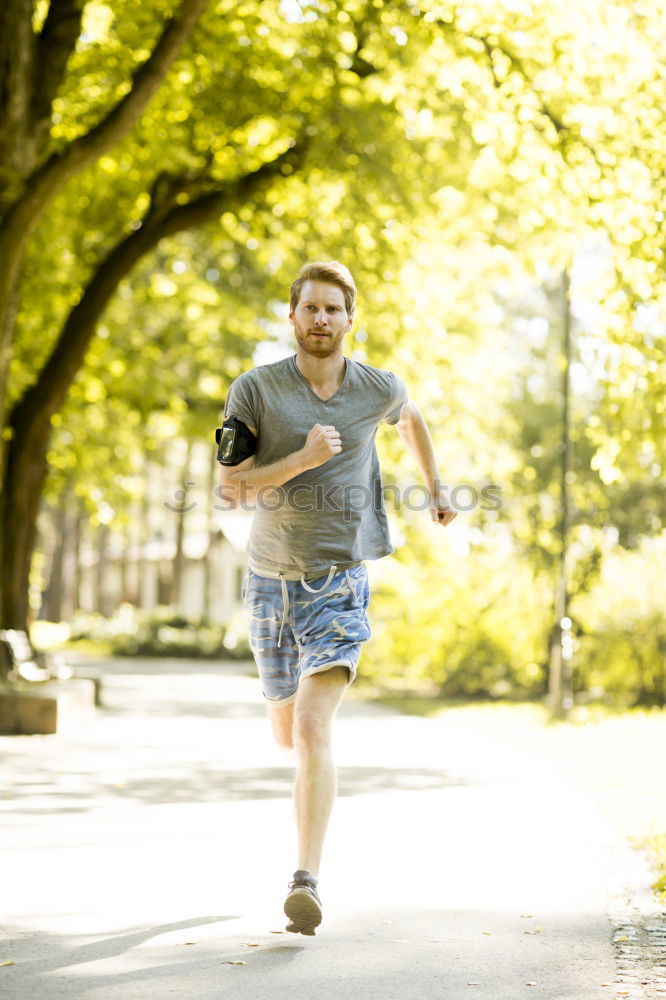 Similar – Senior Man Running in the Forest