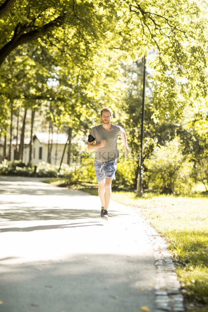 Similar – Senior Man Running in the Forest