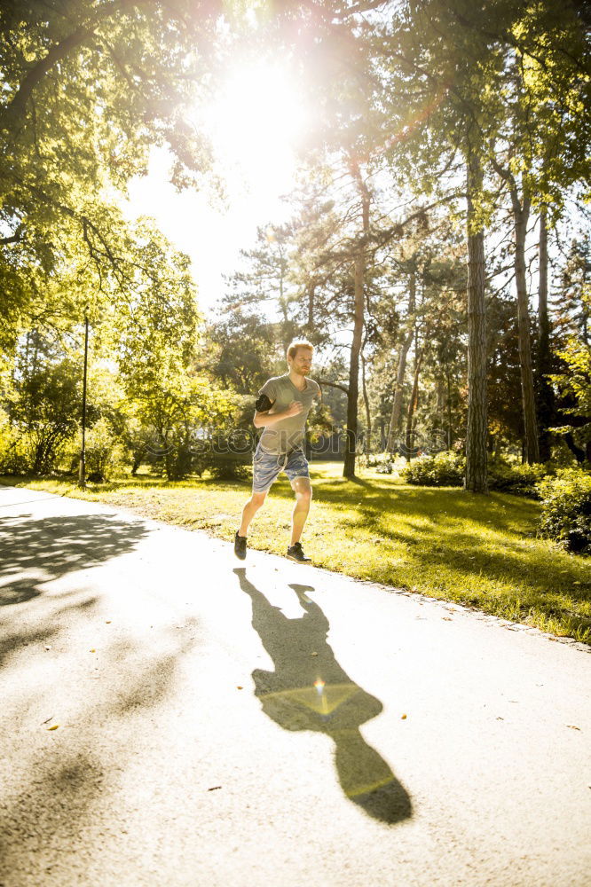 Similar – Senior Man Running in the Forest