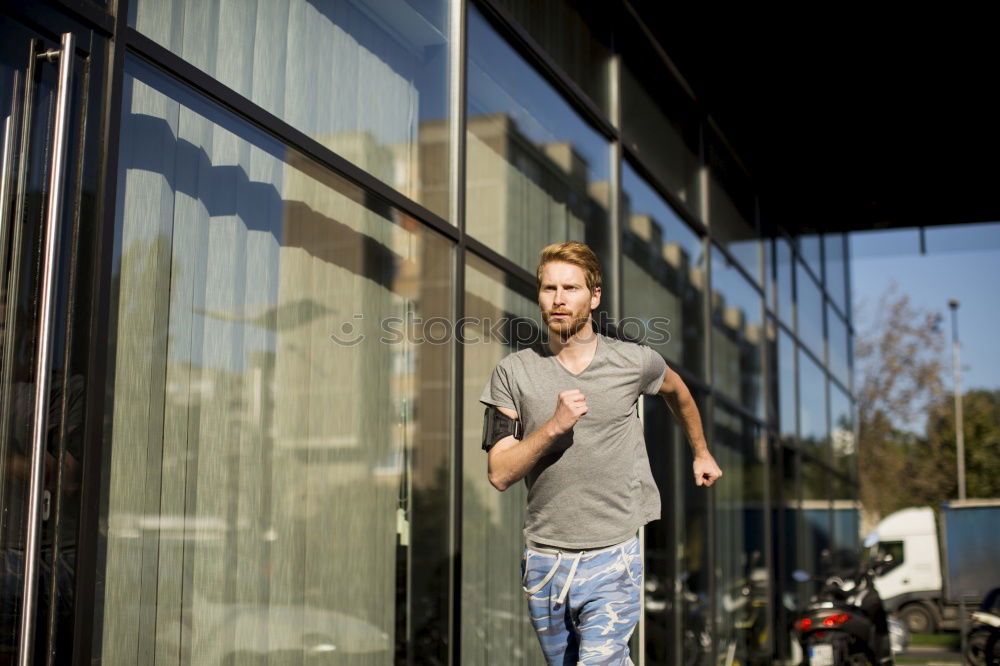 Similar – Foto Bild Der Junge sitzt auf einem Stuhl in einem Stadtcafé.