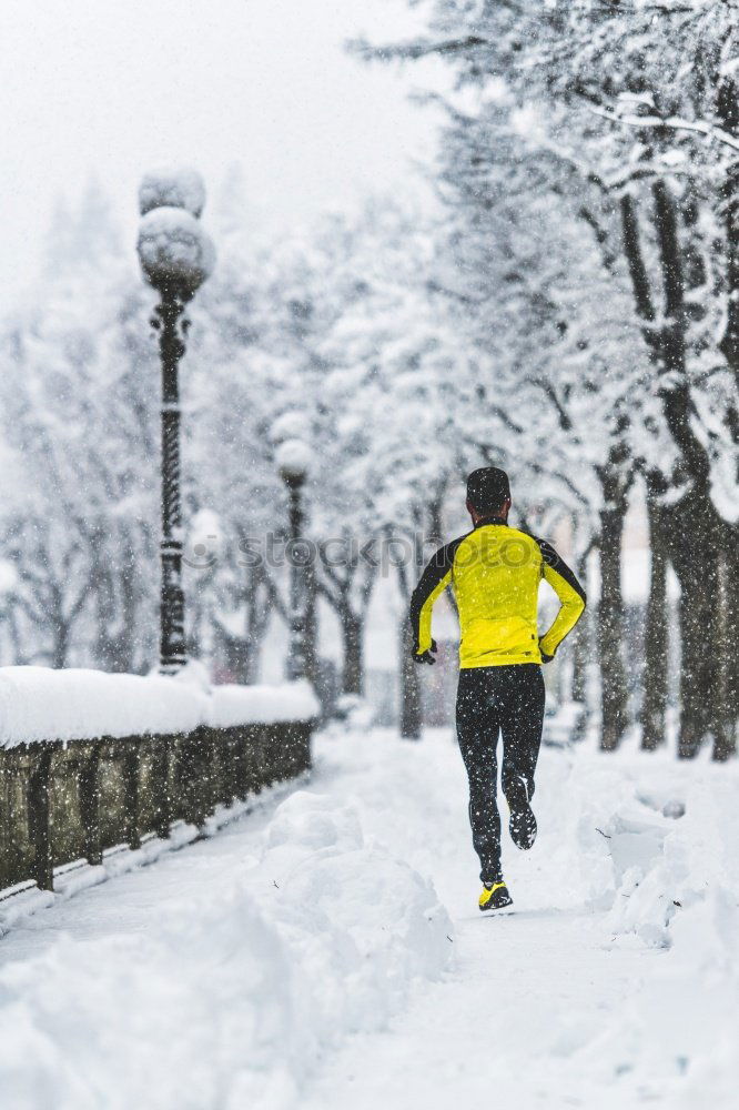 Similar – Man jogging in winter clothing