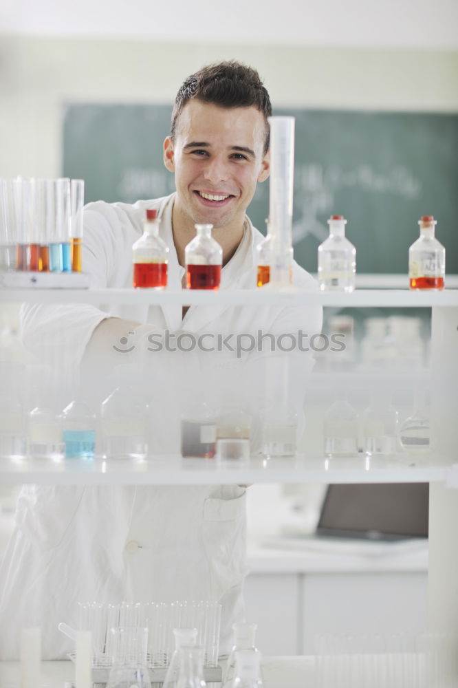 Similar – Image, Stock Photo Young man in lab