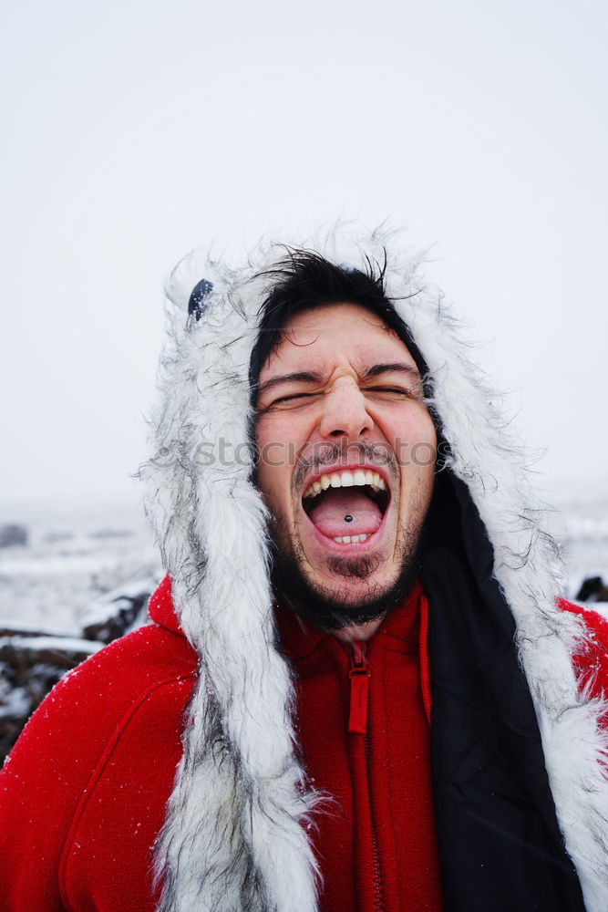 Similar – Image, Stock Photo Young and attractive man enjoying a snowy winter day