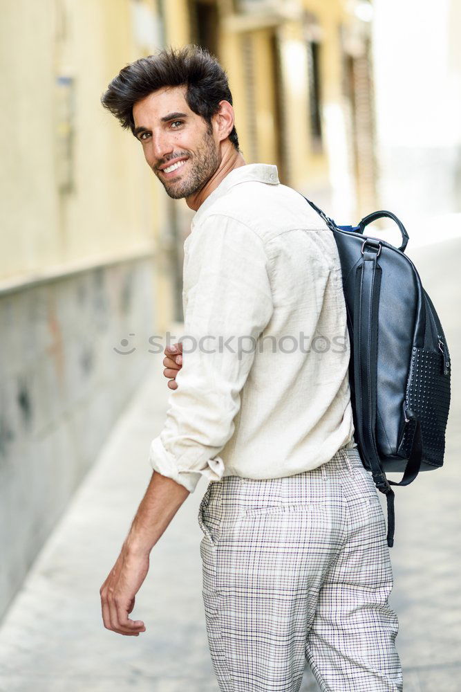 Similar – Young man wearing winter clothes in the street.