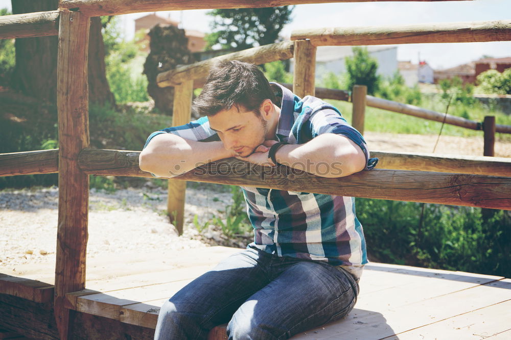 Similar – Image, Stock Photo Young man in a sunny autumn day