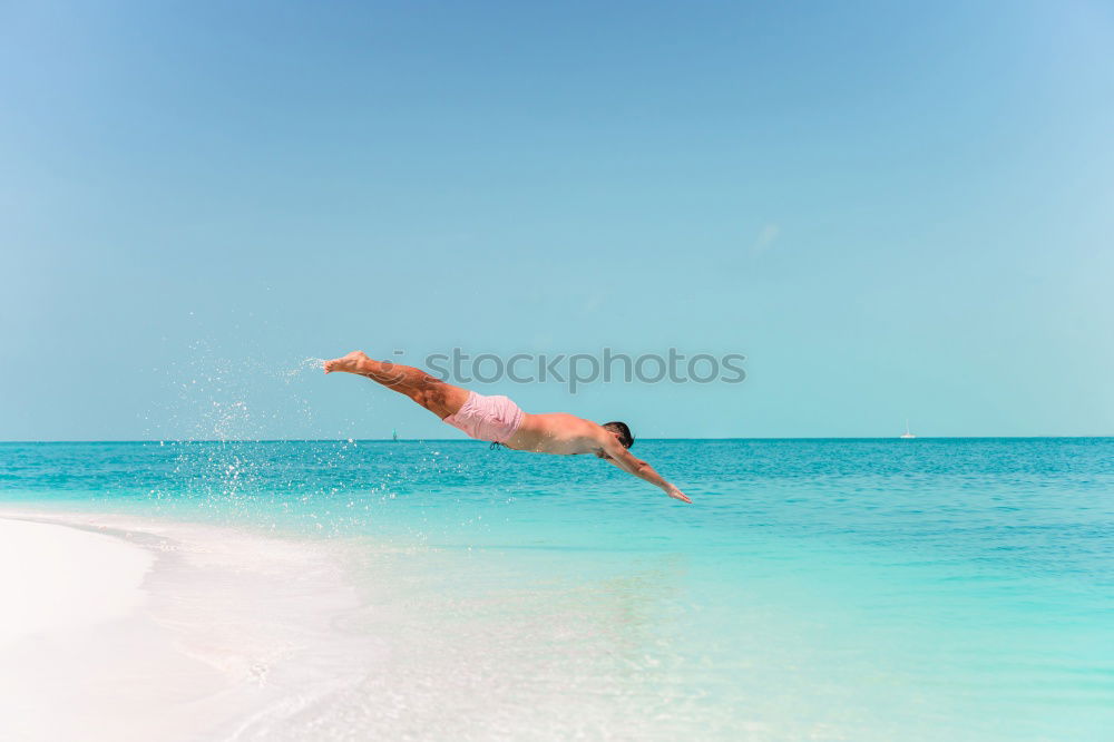 Similar – Happy teen girl jumping on the beach