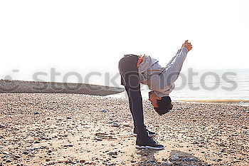 Similar – Black fit woman doing fitness acrobatics