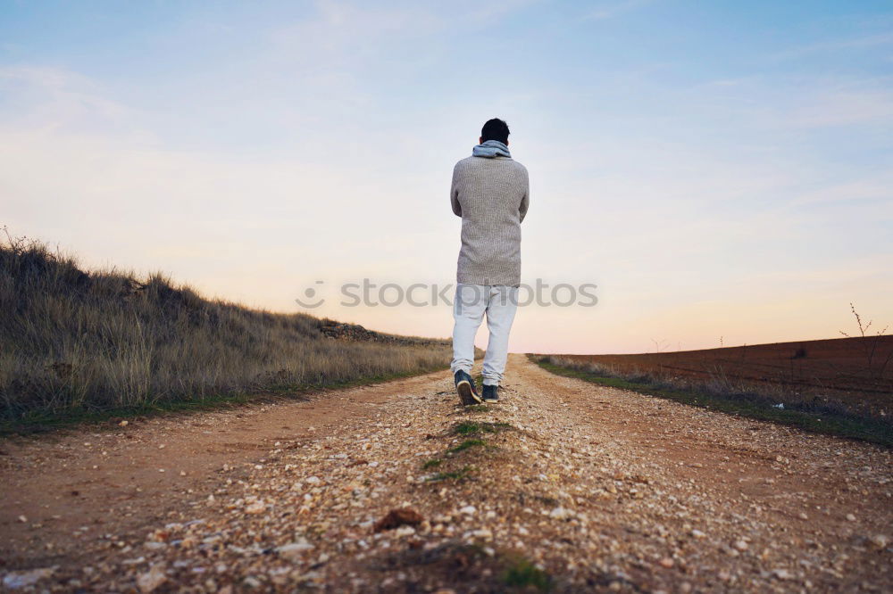 Similar – Image, Stock Photo Woman with jeans walking on wild west