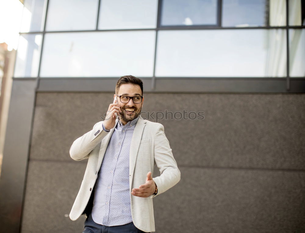 Similar – portrait of a happy man use his phone in the market