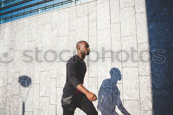 Similar – Image, Stock Photo Smiling man with sunglasses sitting at bicycle